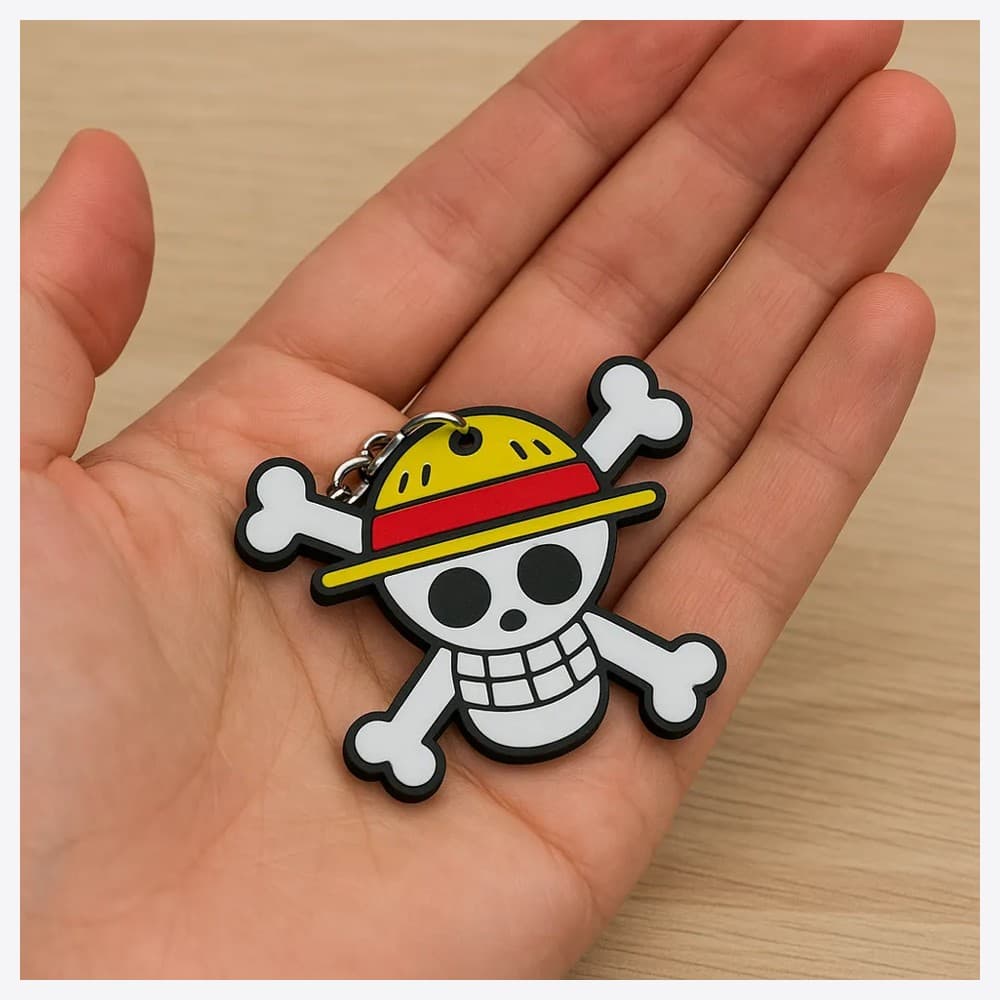 Chaveiro Jolly Roger — na mão