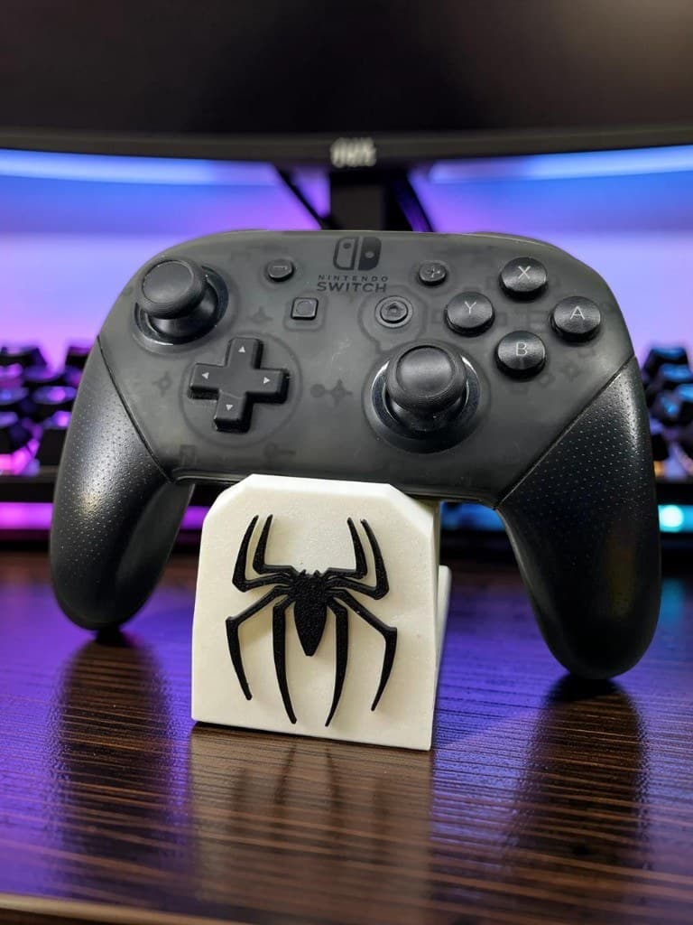 Suporte aranha branco no desk