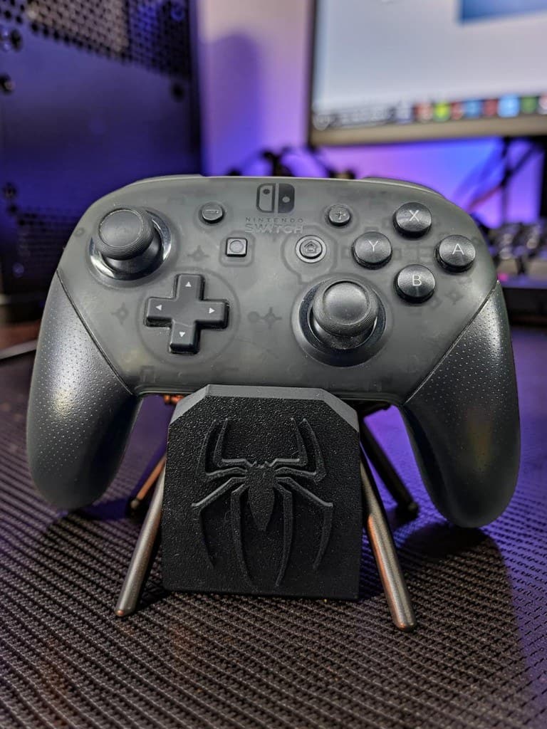Suporte aranha preto no desk