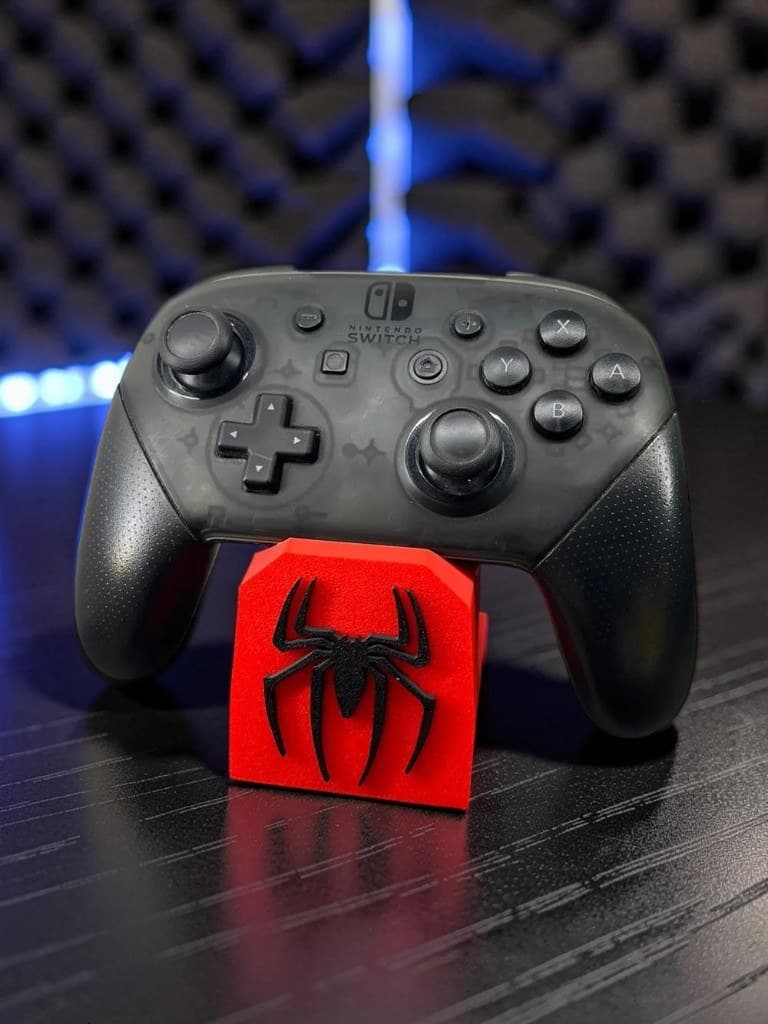 Suporte aranha vermelho no desk